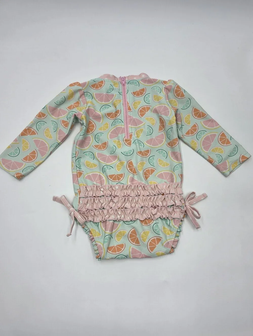 Ruffle Butts baby girl fruit print rashguard swimsuit size 12-18 months